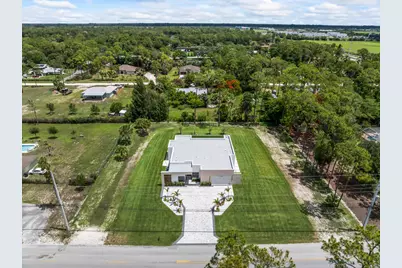 17107 W Sycamore Drive W, The Acreage, FL 33470 - Photo 48