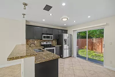 5789 Woodland Point Drive, Tamarac, FL 33319 - Photo 24