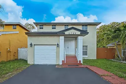 5789 Woodland Point Drive, Tamarac, FL 33319 - Photo 1