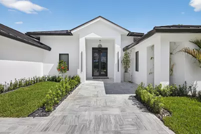 8771 Man O War Road, Palm Beach Gardens, FL 33418 - Photo 1