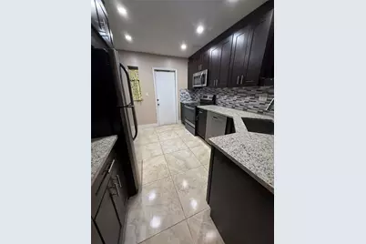 3575 Broken Woods Drive #601, Coral Springs, FL 33065 - Photo 12