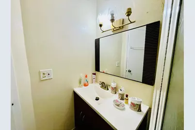 5051 W Oakland Park Boulevard W #Unit E212, Lauderdale Lakes, FL 33313 - Photo 12