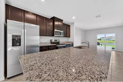 9449 SW Libertas Way, Port Saint Lucie, FL 34987 - Photo 8