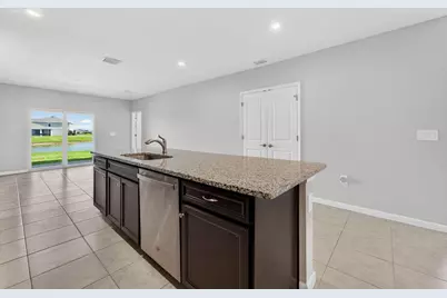 9449 SW Libertas Way, Port Saint Lucie, FL 34987 - Photo 10