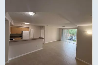 7980 N Nob Hill Road #205, Tamarac, FL 33321 - Photo 12