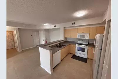 7980 N Nob Hill Road #205, Tamarac, FL 33321 - Photo 2