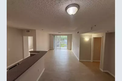 7980 N Nob Hill Road #205, Tamarac, FL 33321 - Photo 1