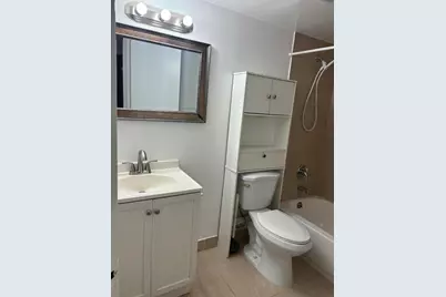 9033 Wiles Road #102, Coral Springs, FL 33067 - Photo 14