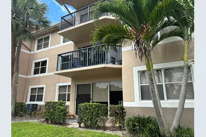 9033 Wiles Road #102, Coral Springs, FL 33067 - Photo 1