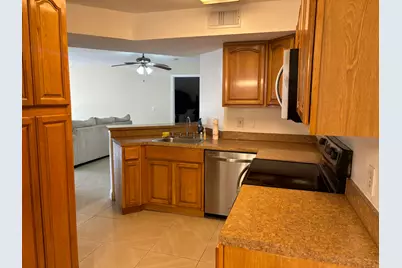 9033 Wiles Road #102, Coral Springs, FL 33067 - Photo 4