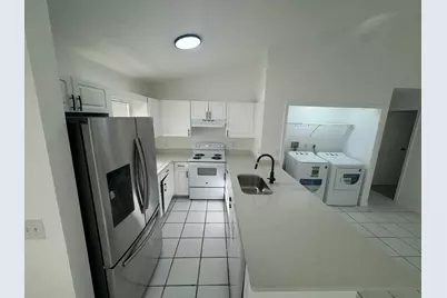 1046 Goldenrod Road #1048, Wellington, FL 33414 - Photo 6