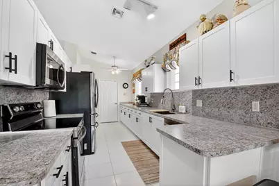 9595 Orchid Grove Trail, Boynton Beach, FL 33437 - Photo 16
