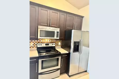 2810 N Oakland Forest Drive #304, Oakland Park, FL 33309 - Photo 6