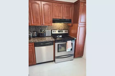 3091 N Course Drive #208, Pompano Beach, FL 33069 - Photo 2