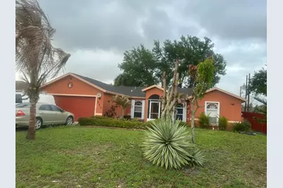 557 SW Baoy Avenue, Port Saint Lucie, FL 34953 - Photo 1