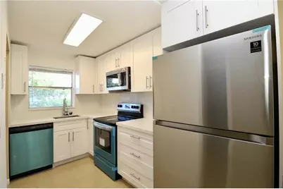 9915 Sandalfoot Boulevard #408, Boca Raton, FL 33428 - Photo 4