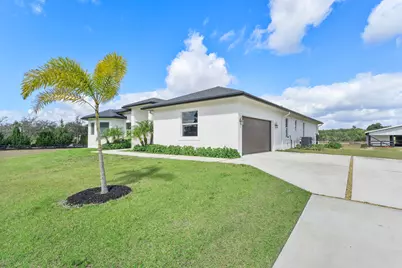 19921 Skyhawk Lane, The Acreage, FL 33470 - Photo 40