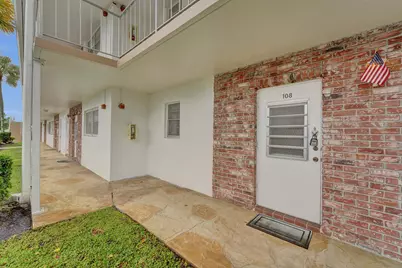2551 W Golf Boulevard #108, Pompano Beach, FL 33064 - Photo 1