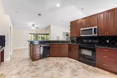17109 Murcott Boulevard, The Acreage, FL 33470 - Photo 10
