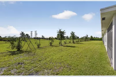 1302 Tangled Orchard Trace, The Acreage, FL 33470 - Photo 54