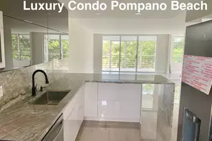 3960 Oaks Clubhouse Dr, Pompano Beach, FL 33069 - Photo 2