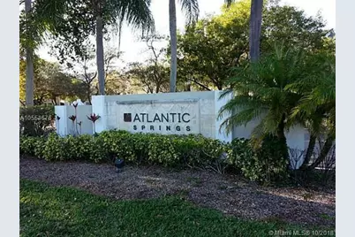 11241 W Atlantic Boulevard #105, Coral Springs, FL 33071 - Photo 1