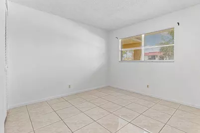 9855 Sandalfoot Boulevard #305, Boca Raton, FL 33428 - Photo 10