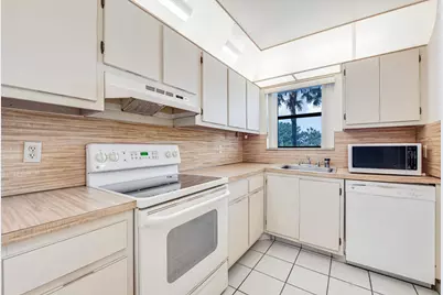 4640 W Lucerne Lakes Blvd #206, Lake Worth, FL 33467 - Photo 10