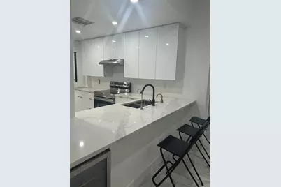 7472 La Paz Boulevard #104, Boca Raton, FL 33433 - Photo 1
