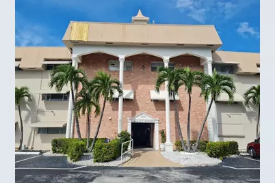 300 Golden Isles Drive #104, Hallandale Beach, FL 33009 - Photo 1