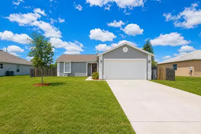 1049 SW McCracken Avenue, Port Saint Lucie, FL 34953 - Photo 1