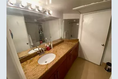 2841 N Oakland Forest Drive #107, Oakland Park, FL 33309 - Photo 10