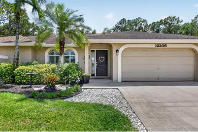 12206 Temple Boulevard, The Acreage, FL 33412 - Photo 2