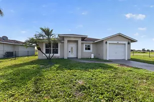 138 Dabou Loop, Belle Glade, FL 33430 - Photo 1