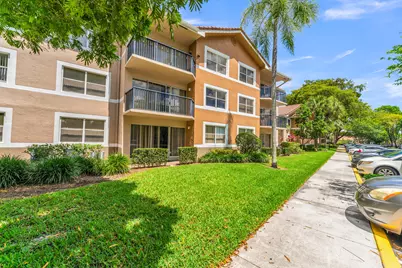 8721 Wiles Road #103, Coral Springs, FL 33067 - Photo 2