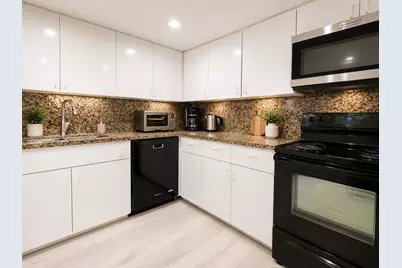 401 Golden Isles Drive #402, Hallandale Beach, FL 33009 - Photo 2
