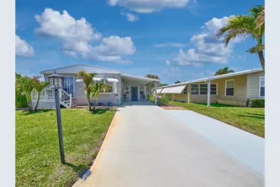 6977 SE Delegate Street, Hobe Sound, FL 33455 - Photo 1