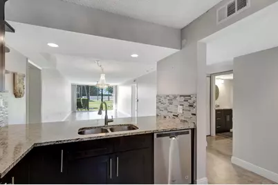 2741 Village Boulevard #104, West Palm Beach, FL 33409 - Photo 4