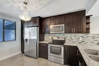 2741 Village Boulevard #104, West Palm Beach, FL 33409 - Photo 1