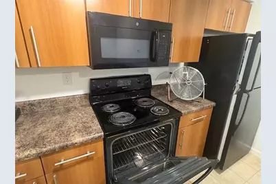 5980 W Sample Road #203, Coral Springs, FL 33063 - Photo 8