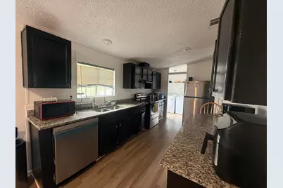 10548 W Sandalfoot Blvd, Boca Raton, FL 33428 - Photo 6