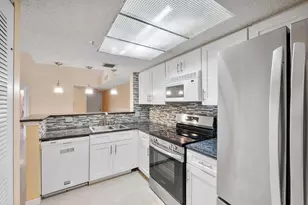 5011 Wiles Rd, Coconut Creek, FL 33073 - Photo 1