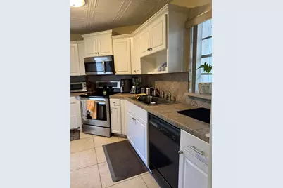 7 N Greenway Vlg Village N #107, Royal Palm Beach, FL 33411 - Photo 6