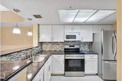 5011 Wiles Road #303, Coconut Creek, FL 33073 - Photo 14