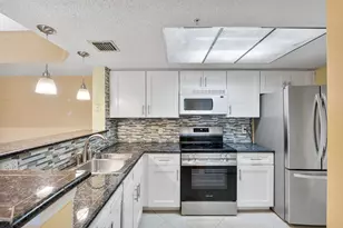 5011 Wiles Rd, Coconut Creek, FL 33073 - Photo 14