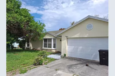 374 SW De Gouvea Terrace, Port Saint Lucie, FL 34984 - Photo 1