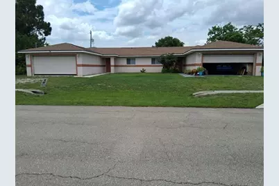 113 S John Ave Avenue S, Lehigh Acres, FL 33973 - Photo 1
