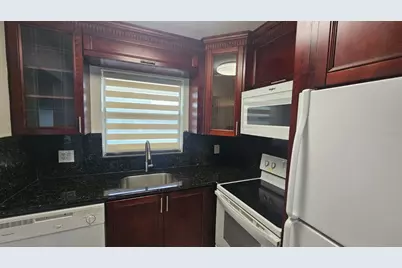 9911 Sandalfoot Boulevard #116, Boca Raton, FL 33428 - Photo 2
