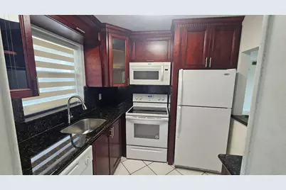 9911 Sandalfoot Boulevard #116, Boca Raton, FL 33428 - Photo 1