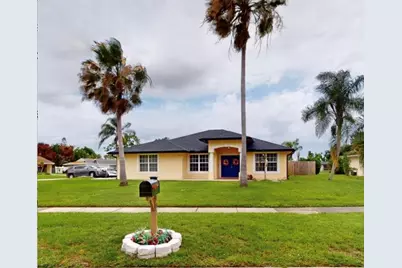 201 NE Faring Avenue, Port Saint Lucie, FL 34983 - Photo 1